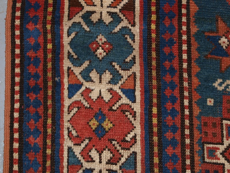 Antique Caucasian Karachov Kazak Rug on Green Grou-cotswold-oriental-rugs-pa077752-main-637788123962459290.JPG