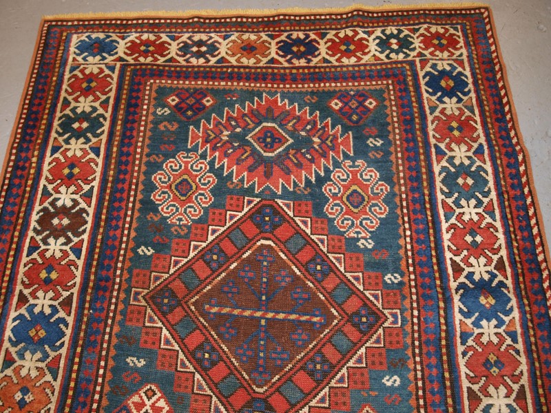 Antique Caucasian Karachov Kazak Rug on Green Grou-cotswold-oriental-rugs-pa077753-main-637788123989333589.JPG