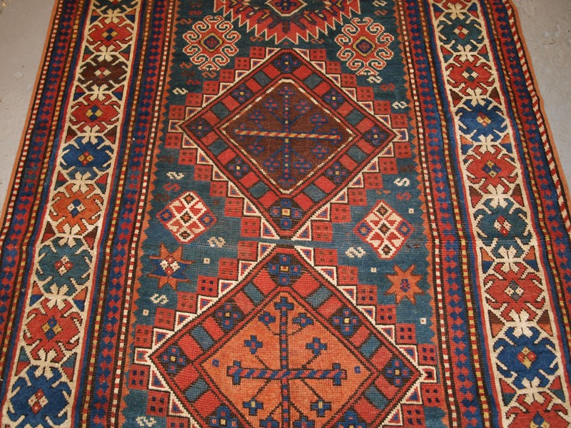 Antique Caucasian Karachov Kazak Rug on Green Grou-cotswold-oriental-rugs-pa077754-main-637788124015271210.JPG