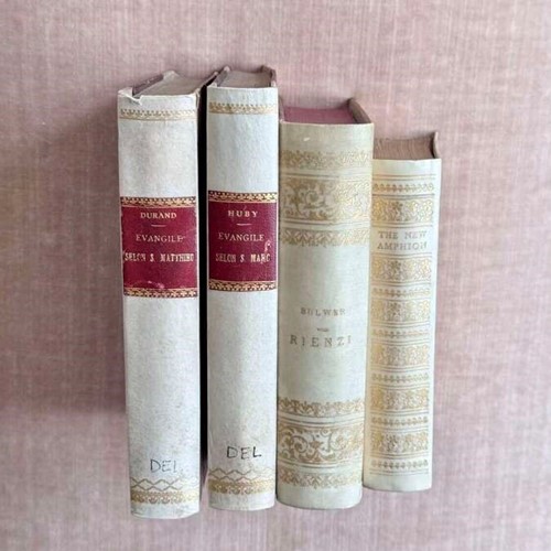 Decorative gold tooled vellum bound books