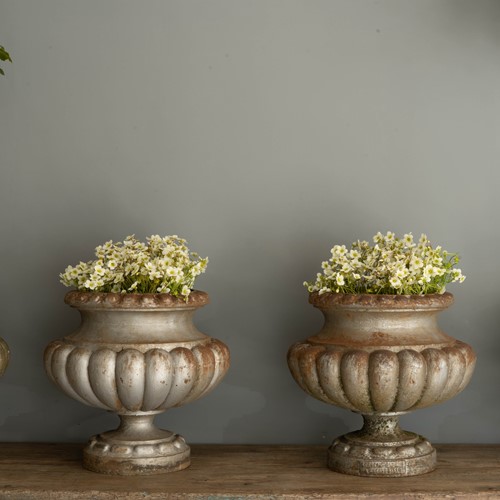 Set of four Alfred Corneau Urns