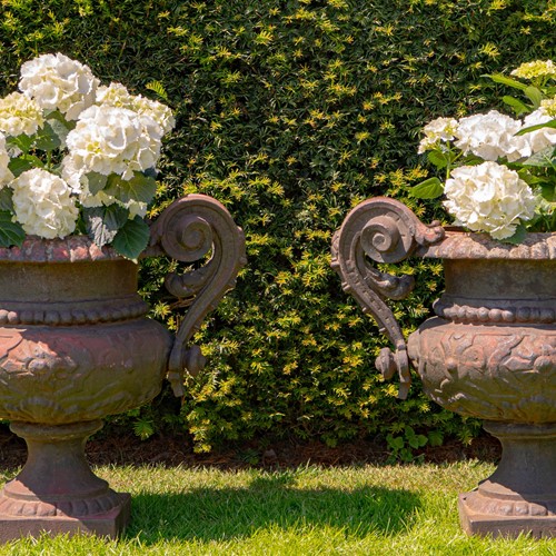 A pair of antique Cast Iron French Garden Urns