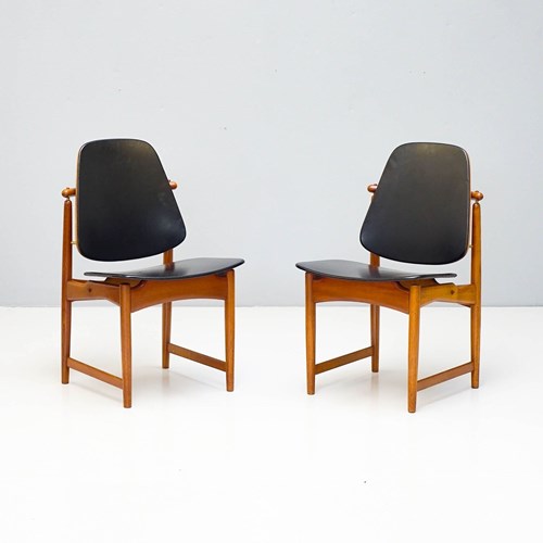 Pair Of Danish Teak And Leather Chairs