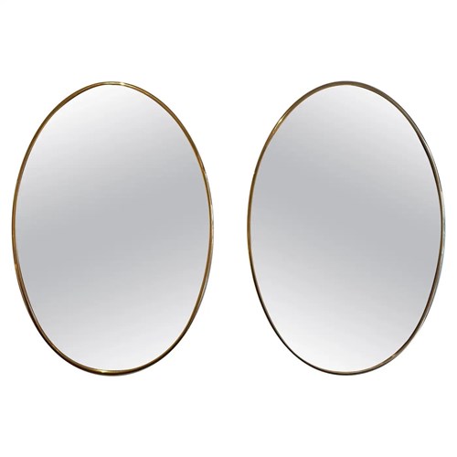Pair Of Brass Oval Mirrors