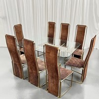 Dining chairs by Alain Delon 