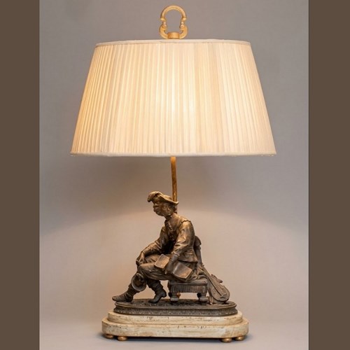 Single Figure Of Man Sitting Made Into Lamp