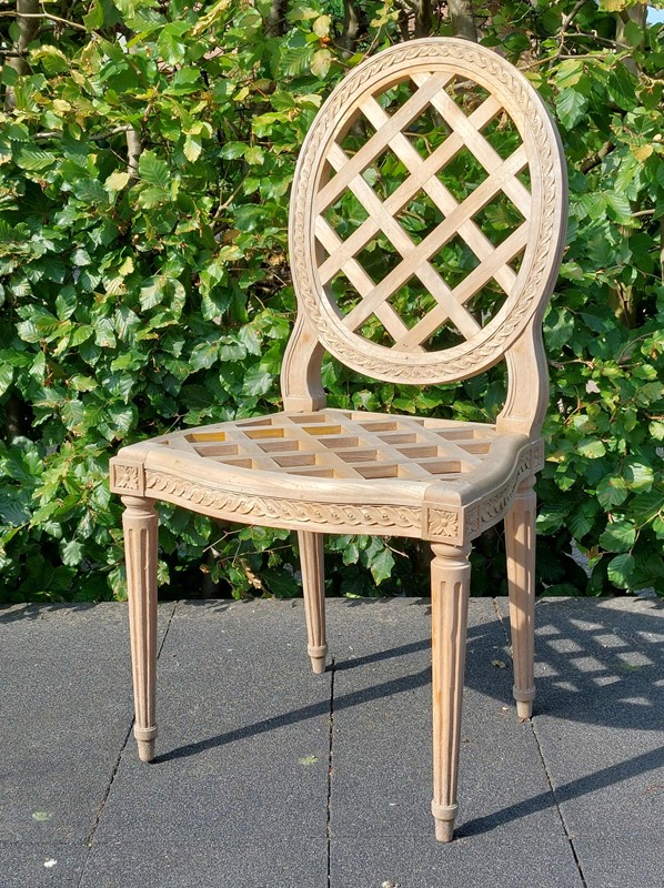 4 carved teak classic outdoor side chairs -empel-collections-outdoor-teak--classic-garden-chairs-002-main-637942560153303671.jpg