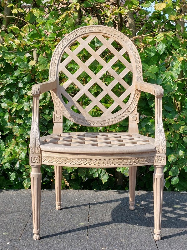 4 carved teak classic outdoor side chairs -empel-collections-outdoor-teak--classic-garden-chairs-003-main-637942560306432162.jpg