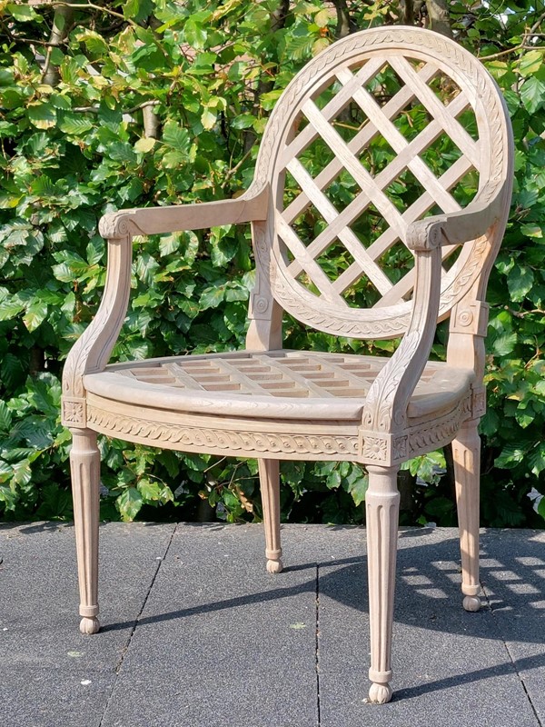 4 carved teak classic outdoor side chairs -empel-collections-outdoor-teak--classic-garden-chairs-004-main-637942560319557237.jpg