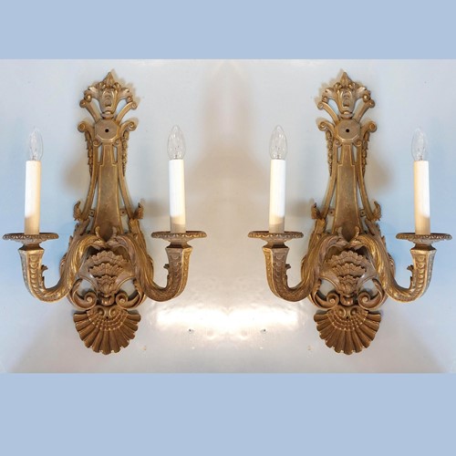 Pair of large bronze antique wall lights