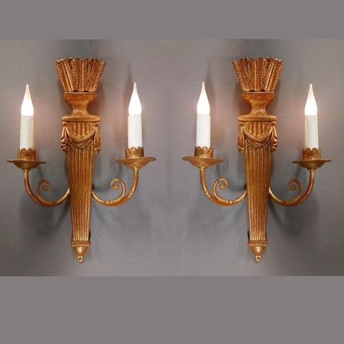 Pair gilt wood 'flech' wall lamps