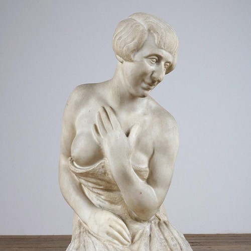 Antique marble sculpture of a kneeling female