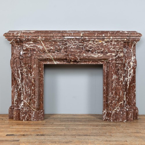 Antique rouge marble fire surround