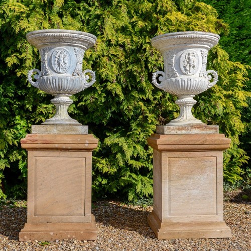 Rare late 19C ornate cast iron urns