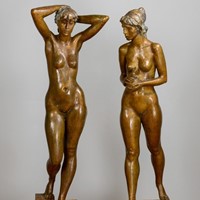 Near life-size bronze nude female statues