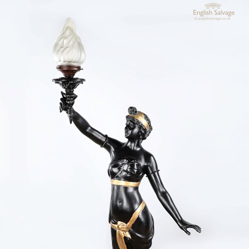 Early 20C Lady holding torch black gold lamp