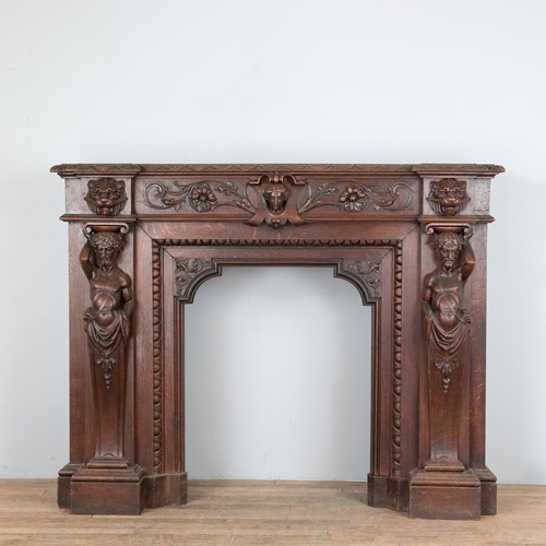 19th century Flemish oak fire surround