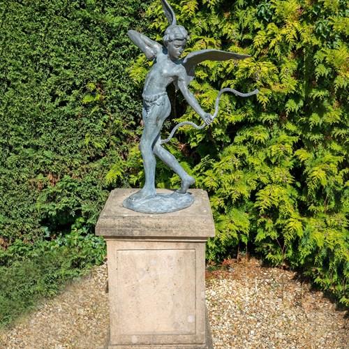An Antique Lead Figure Or Statue Of Eros