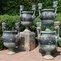 Set of four bronze Versailles urns