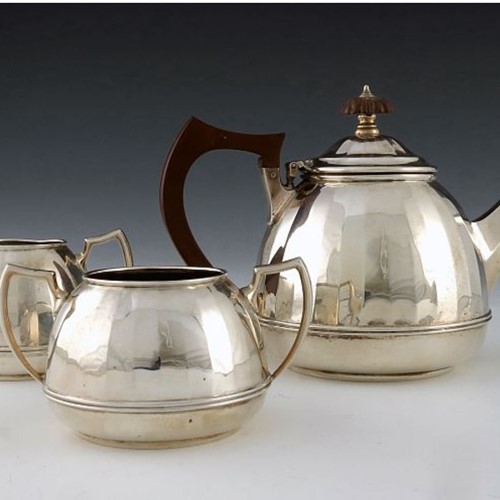 George VI Domed And Faceted Silver Tea Set,  1936