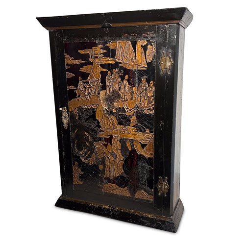 Regency Lacquered And Ebonised Wall Cabinet With Carved Door