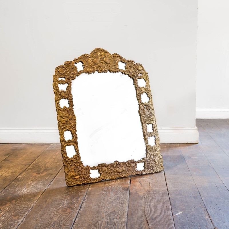 An unusual repousse gilt brass easel mirror-foster-and-gane-26210724883726707-main-637037281286714721.jpg