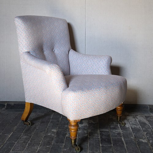 19Th C Oak Framed Shapely Armchair On Brass Castors