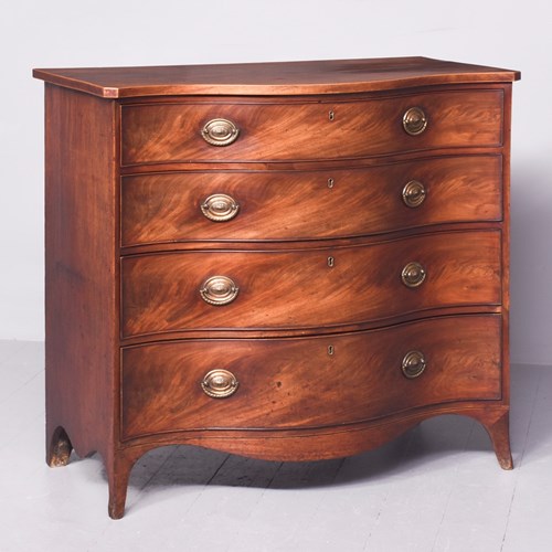 George III Serpentine Fronted Figured Mahogany Chest Of Drawers 