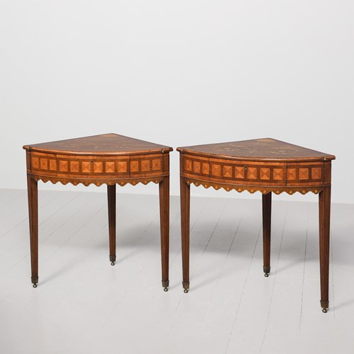 A Pair Of Mahogany, Satinwood, Fruitwood And Marquetry Corner Tables