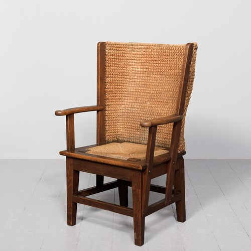 A Good Quality Oak Framed Straw Back Orkney Chair