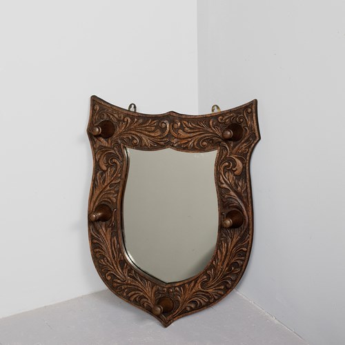 Carved Oak Heraldic Mirror With Wooden Hooks