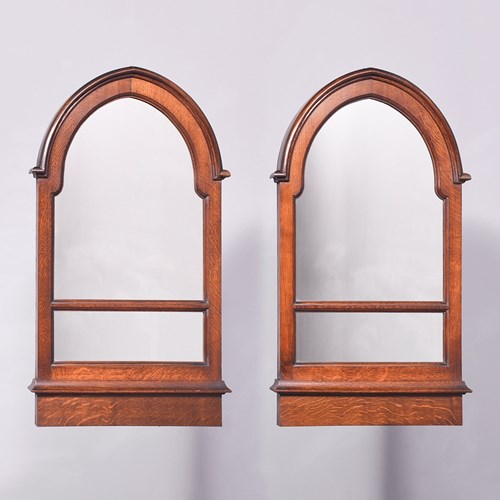 Pair Of Oak Framed Gothic Style Wall Mirrors