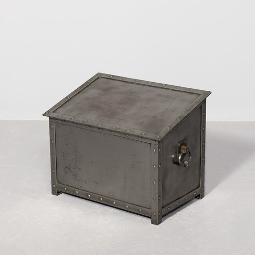 An Arts & Crafts Sloping Polished Steel Log Bin