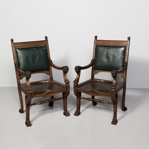 Renaissance-Style Figured Mahogany And Green Hide Upholstered Chairs