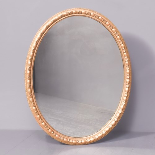 Large Oval Victorian Carved Giltwood Mirror