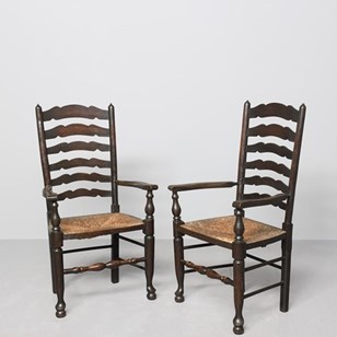 Pair Of Stained Elm Ladder-Back Arm...