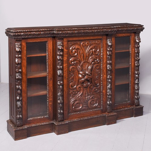 Mid-Victorian Flemish Profusely Carved Breakfront Glazed Bookcase