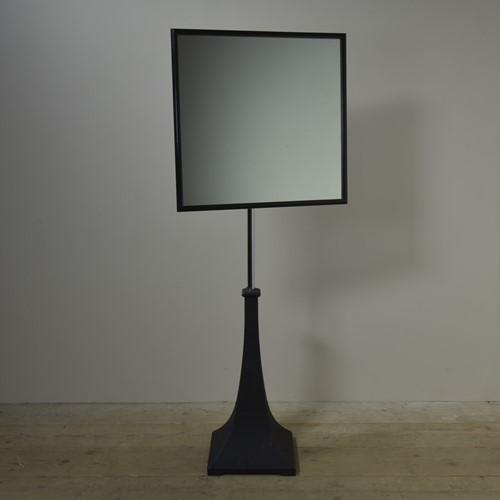 Antique opticians mirror on stand
