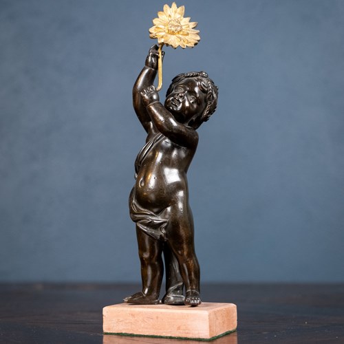 19Th Century Bronze Putto Holding A Flower