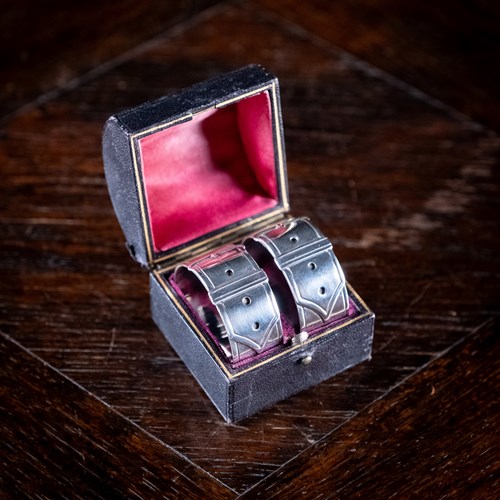 Cased Pair Silver Belt Buckle Napkin Rings By James Dixon & Sons, 1894.