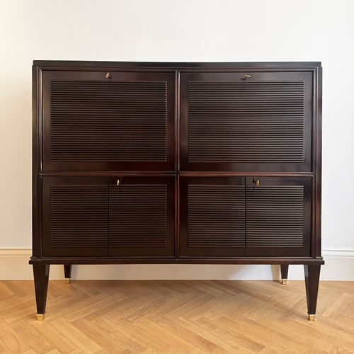 A Midcentury Reeded Cabinet With Foldout Desk