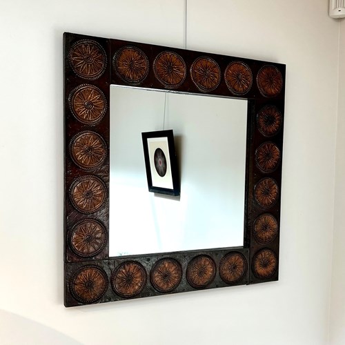 An Italian Decorative Copper Mirror