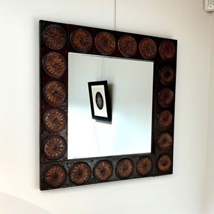 A Decorative Italian Copper Mirror
