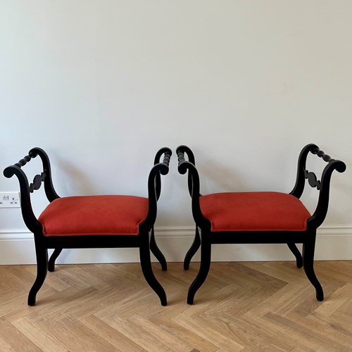 A Pair Of Ebonised Side Stools