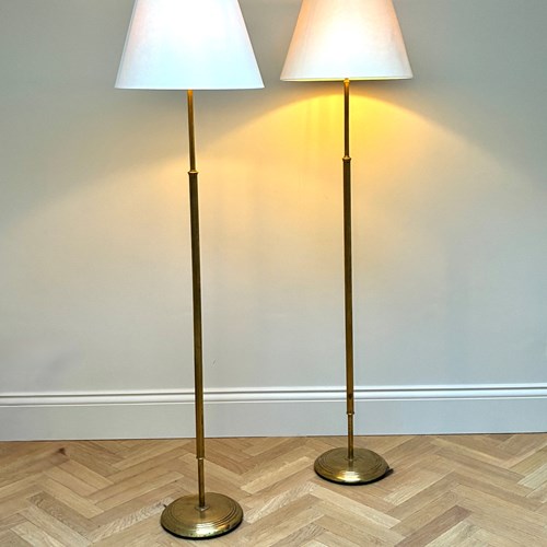A Pair Of Swedish Brass Floor Lamps By Bertil Brisborg
