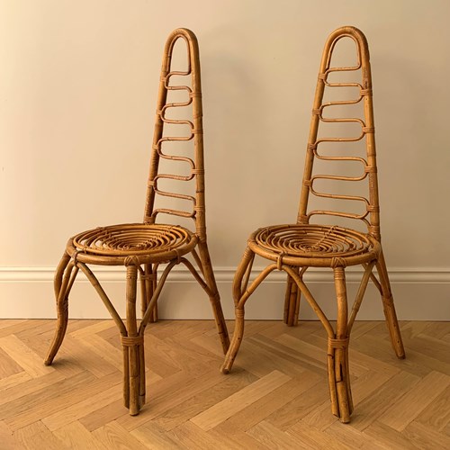 A Pair Of High Back Bamboo Chairs