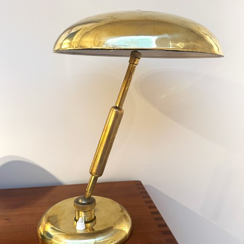 An Articulating Brass Desk Lamp