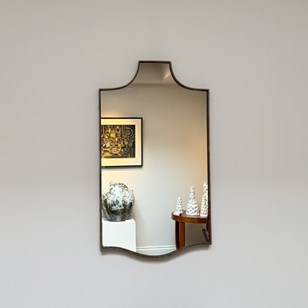 A Beaded Brass Shield Mirror, Circa...