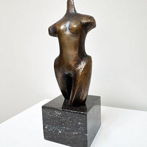 A Bronze Sculpture Of A Female Form