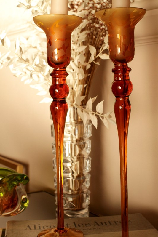 A Pair Of Elegant Amber Glass Candleholders-house-of-hummingbird-4642dee8-2b63-4987-87fd-c37619559bc4-main-638034230968736867.jpeg